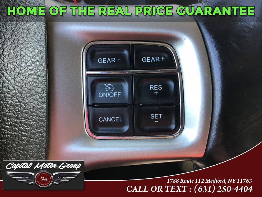 Used Ram 1500 4WD Crew Cab 140.5" Laramie 2014 | Capital Motor Group Inc. Medford, New York Used Ram 1500 4WD Crew Cab 140.5" Laramie 2014 | Capital Motor Group Inc. Medford, New York