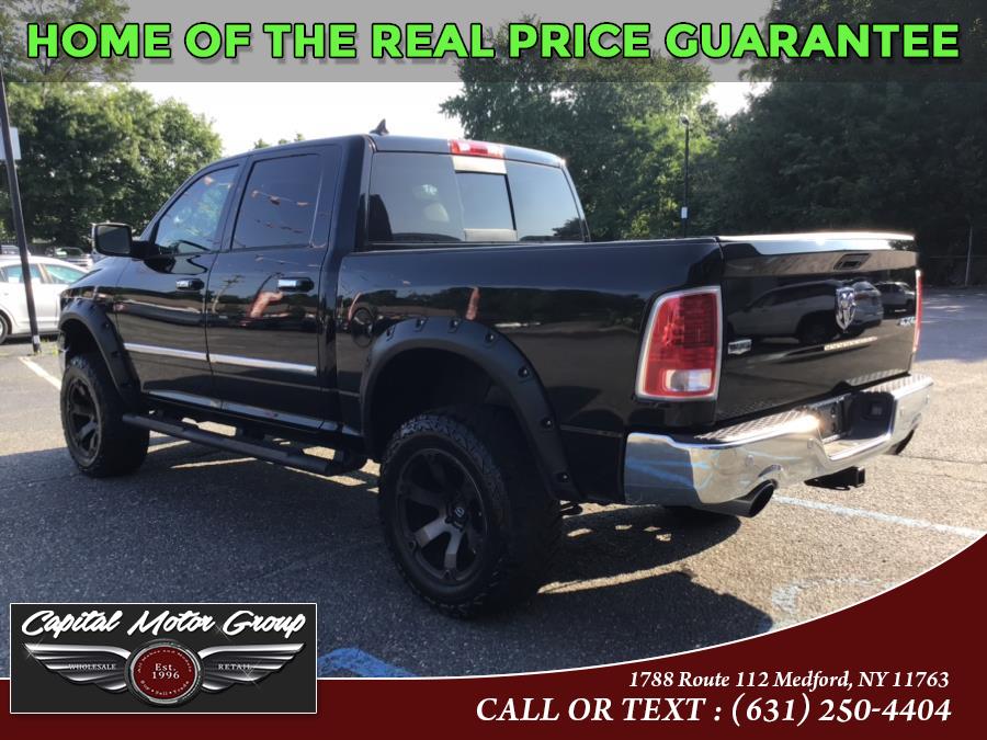 Used Ram 1500 4WD Crew Cab 140.5" Laramie 2014 | Capital Motor Group Inc. Medford, New York Used Ram 1500 4WD Crew Cab 140.5" Laramie 2014 | Capital Motor Group Inc. Medford, New York