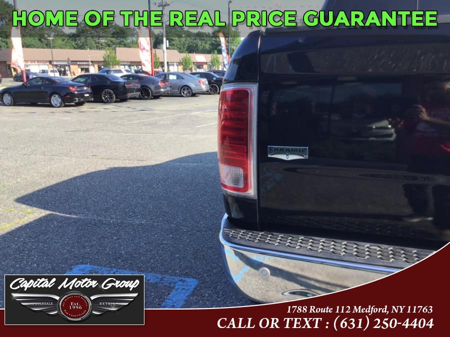 Used Ram 1500 4WD Crew Cab 140.5" Laramie 2014 | Capital Motor Group Inc. Medford, New York Used Ram 1500 4WD Crew Cab 140.5" Laramie 2014 | Capital Motor Group Inc. Medford, New York