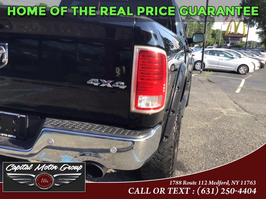 Used Ram 1500 4WD Crew Cab 140.5" Laramie 2014 | Capital Motor Group Inc. Medford, New York Used Ram 1500 4WD Crew Cab 140.5" Laramie 2014 | Capital Motor Group Inc. Medford, New York
