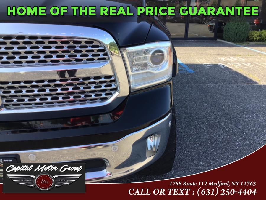 Used Ram 1500 4WD Crew Cab 140.5" Laramie 2014 | Capital Motor Group Inc. Medford, New York Used Ram 1500 4WD Crew Cab 140.5" Laramie 2014 | Capital Motor Group Inc. Medford, New York
