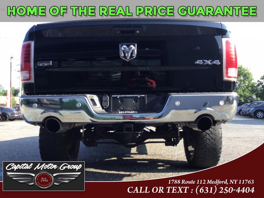 Used Ram 1500 4WD Crew Cab 140.5" Laramie 2014 | Capital Motor Group Inc. Medford, New York Used Ram 1500 4WD Crew Cab 140.5" Laramie 2014 | Capital Motor Group Inc. Medford, New York