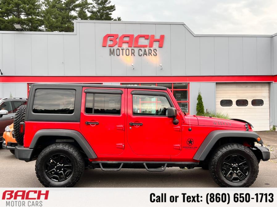 2015 Jeep Wrangler Unlimited 4WD 4dr Sport, available for sale in Canton , Connecticut | Bach Motor Cars. Canton , Connecticut