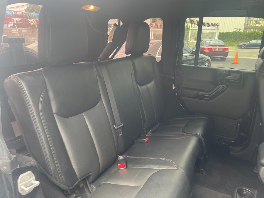 2015 Jeep Wrangler Unlimited 4WD 4dr Altitude Sahara, available for sale in Paterson, New Jersey | DZ Automall. Paterson, New Jersey 2015 Jeep Wrangler Unlimited 4WD 4dr Altitude Sahara, available for sale in Paterson, New Jersey | DZ Automall. Paterson, New Jersey