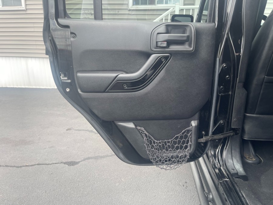 2015 Jeep Wrangler Unlimited 4WD 4dr Altitude Sahara, available for sale in Paterson, New Jersey | DZ Automall. Paterson, New Jersey 2015 Jeep Wrangler Unlimited 4WD 4dr Altitude Sahara, available for sale in Paterson, New Jersey | DZ Automall. Paterson, New Jersey