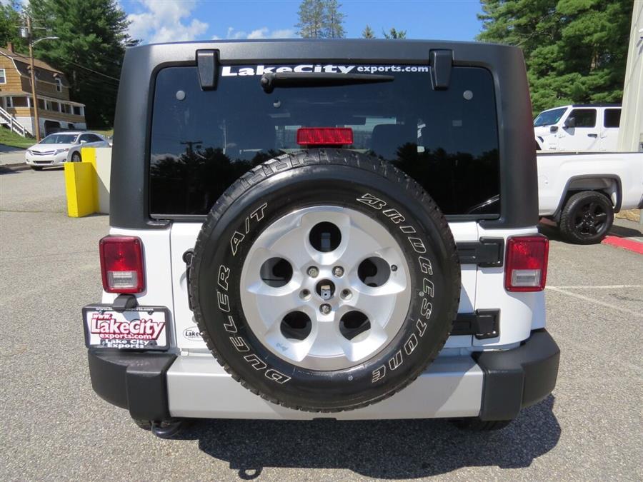 Used Jeep Wrangler Sahara 4x4 2dr SUV 2013 | Lake City Exports Inc. Auburn, Maine Used Jeep Wrangler Sahara 4x4 2dr SUV 2013 | Lake City Exports Inc. Auburn, Maine