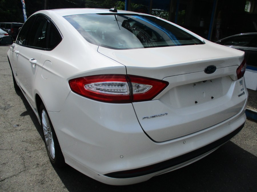 2014 Ford Fusion 4dr Sdn SE Hybrid FWD, available for sale in Meriden, Connecticut | Cos Central Auto. Meriden, Connecticut 2014 Ford Fusion 4dr Sdn SE Hybrid FWD, available for sale in Meriden, Connecticut | Cos Central Auto. Meriden, Connecticut