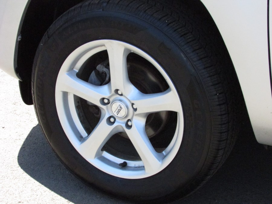 2012 Toyota RAV4 4WD 4dr I4 (Natl), available for sale in East Windsor, Connecticut | United Auto Sales of E Windsor, Inc. East Windsor, Connecticut 2012 Toyota RAV4 4WD 4dr I4 (Natl), available for sale in East Windsor, Connecticut | United Auto Sales of E Windsor, Inc. East Windsor, Connecticut