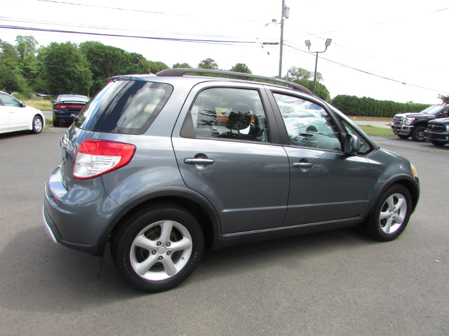 2009 Suzuki SX4 5dr HB Man AWD, available for sale in East Windsor, Connecticut | United Auto Sales of E Windsor, Inc. East Windsor, Connecticut 2009 Suzuki SX4 5dr HB Man AWD, available for sale in East Windsor, Connecticut | United Auto Sales of E Windsor, Inc. East Windsor, Connecticut