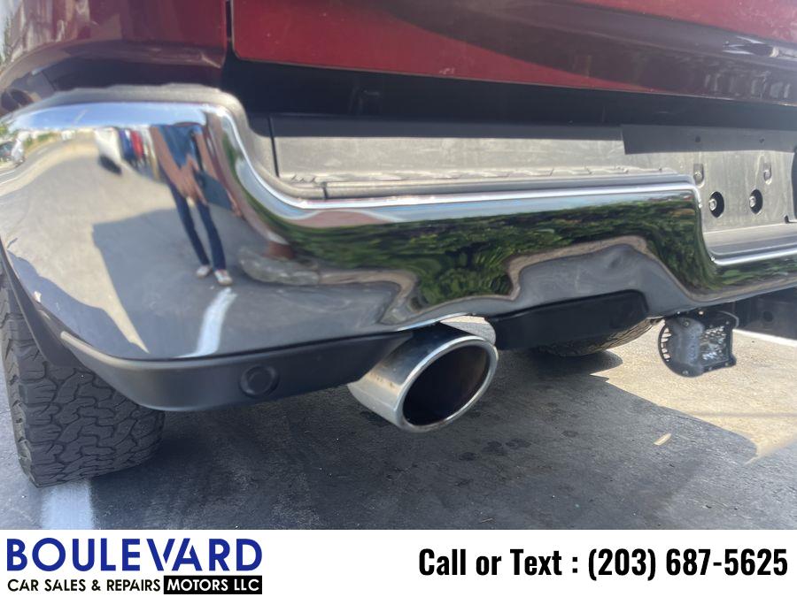 2021 Ram 1500 Quad Cab Big Horn Pickup 4D 6 1/3 ft, available for sale in New Haven, Connecticut | Boulevard Motors LLC. New Haven, Connecticut 2021 Ram 1500 Quad Cab Big Horn Pickup 4D 6 1/3 ft, available for sale in New Haven, Connecticut | Boulevard Motors LLC. New Haven, Connecticut