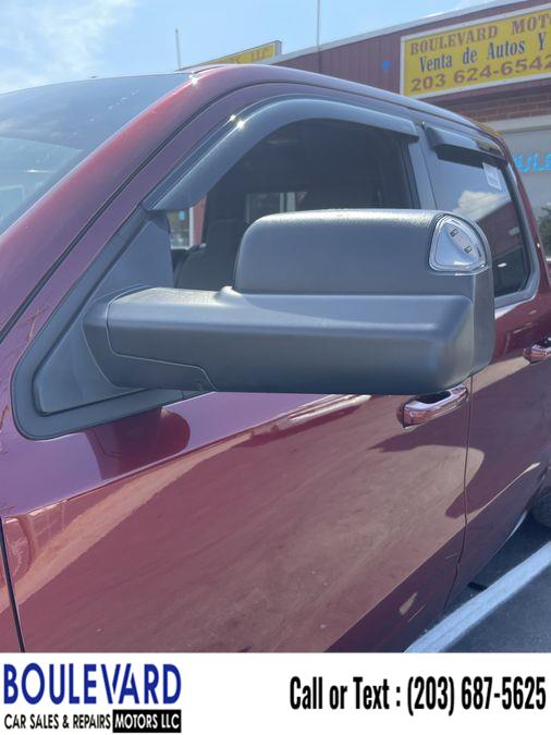 2021 Ram 1500 Quad Cab Big Horn Pickup 4D 6 1/3 ft, available for sale in New Haven, Connecticut | Boulevard Motors LLC. New Haven, Connecticut 2021 Ram 1500 Quad Cab Big Horn Pickup 4D 6 1/3 ft, available for sale in New Haven, Connecticut | Boulevard Motors LLC. New Haven, Connecticut