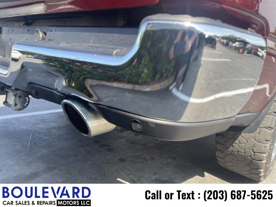 2021 Ram 1500 Quad Cab Big Horn Pickup 4D 6 1/3 ft, available for sale in New Haven, Connecticut | Boulevard Motors LLC. New Haven, Connecticut 2021 Ram 1500 Quad Cab Big Horn Pickup 4D 6 1/3 ft, available for sale in New Haven, Connecticut | Boulevard Motors LLC. New Haven, Connecticut