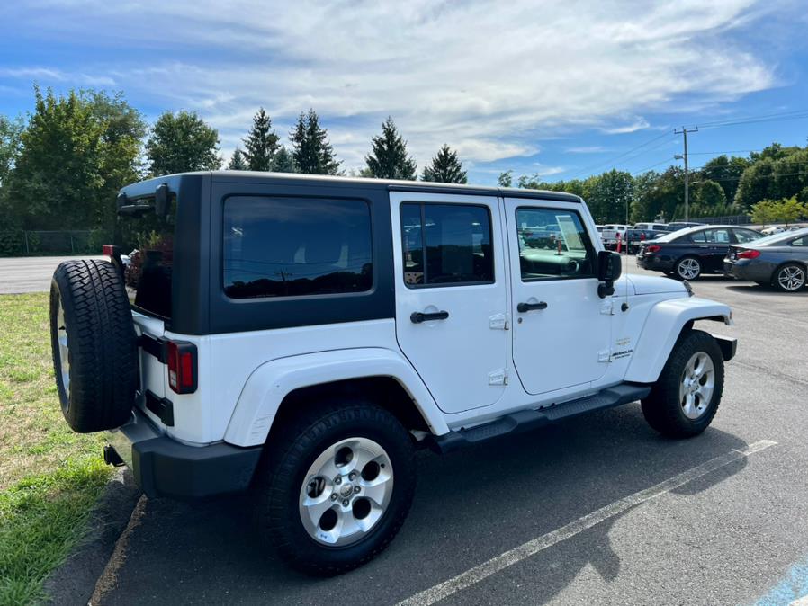 2014 Jeep Wrangler Unlimited 4WD 4dr Sahara, available for sale in Berlin, Connecticut | Tru Auto Mall. Berlin, Connecticut 2014 Jeep Wrangler Unlimited 4WD 4dr Sahara, available for sale in Berlin, Connecticut | Tru Auto Mall. Berlin, Connecticut