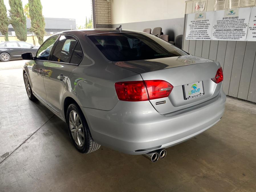 2011 Volkswagen Jetta Sedan 4dr Auto SE w/Convenience & Sunroof PZEV, available for sale in Garden Grove, California | U Save Auto Auction. Garden Grove, California 2011 Volkswagen Jetta Sedan 4dr Auto SE w/Convenience & Sunroof PZEV, available for sale in Garden Grove, California | U Save Auto Auction. Garden Grove, California