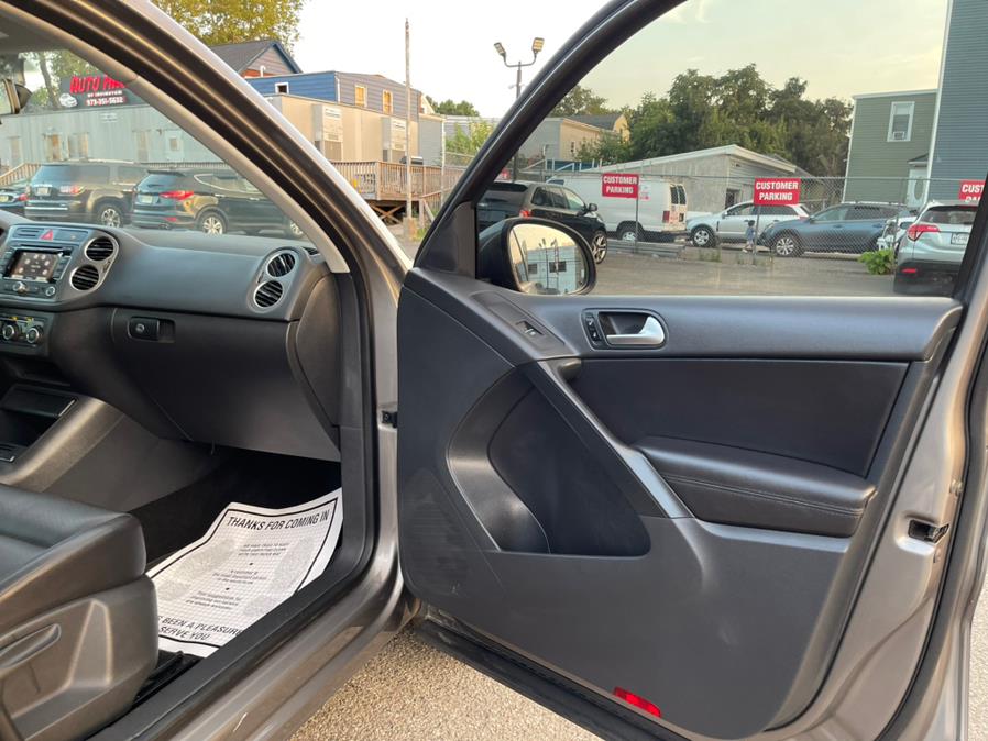 2011 Volkswagen Tiguan 4WD 4dr SE 4Motion wSunroof & Navi, available for sale in Irvington , New Jersey | Auto Haus of Irvington Corp. Irvington , New Jersey 2011 Volkswagen Tiguan 4WD 4dr SE 4Motion wSunroof & Navi, available for sale in Irvington , New Jersey | Auto Haus of Irvington Corp. Irvington , New Jersey