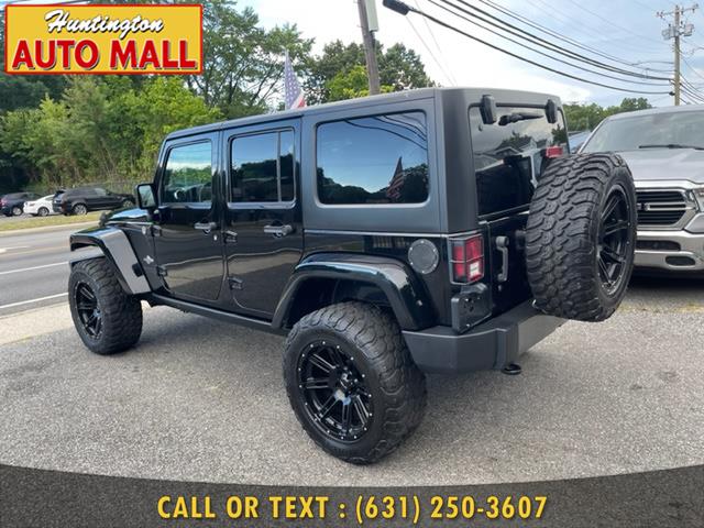 Used Jeep Wrangler Unlimited 4WD 4dr Freedom Package 2015 | Huntington Auto Mall. Huntington Station, New York Used Jeep Wrangler Unlimited 4WD 4dr Freedom Package 2015 | Huntington Auto Mall. Huntington Station, New York