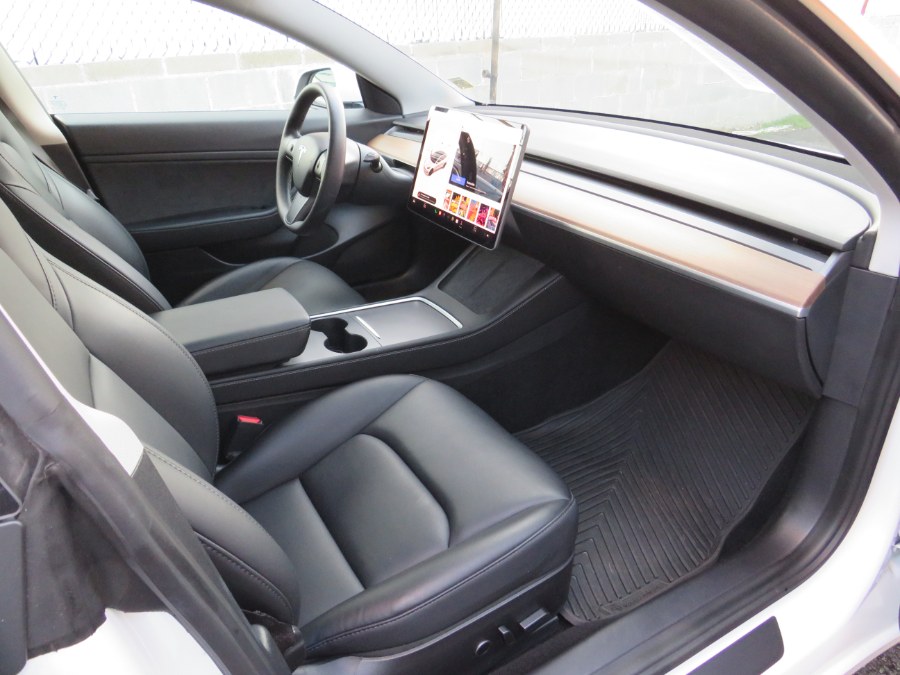 2021 Tesla Model 3 Standard Range Plus, available for sale in Middle Village, New York | Road Masters II INC. Middle Village, New York 2021 Tesla Model 3 Standard Range Plus, available for sale in Middle Village, New York | Road Masters II INC. Middle Village, New York