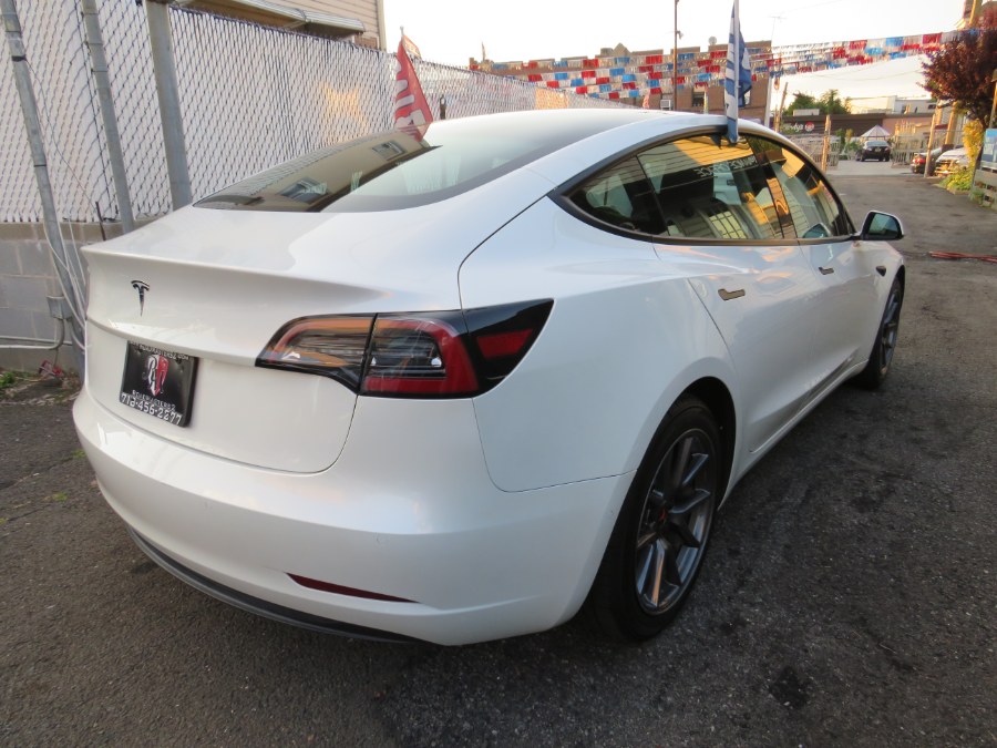 2021 Tesla Model 3 Standard Range Plus, available for sale in Middle Village, New York | Road Masters II INC. Middle Village, New York 2021 Tesla Model 3 Standard Range Plus, available for sale in Middle Village, New York | Road Masters II INC. Middle Village, New York