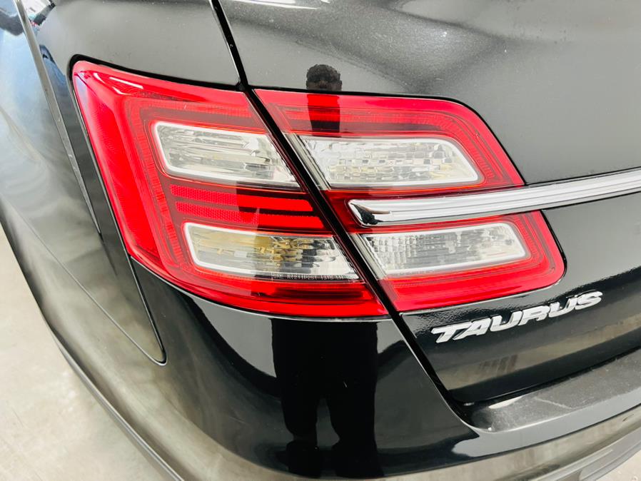 2014 Ford Taurus 4dr Sdn SHO AWD, available for sale in Linden, New Jersey | East Coast Auto Group. Linden, New Jersey 2014 Ford Taurus 4dr Sdn SHO AWD, available for sale in Linden, New Jersey | East Coast Auto Group. Linden, New Jersey