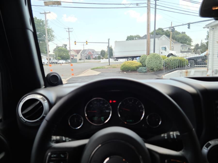 2014 Jeep Wrangler Unlimited 4WD 4dr Sahara, available for sale in Milford, Connecticut | Chip's Auto Sales Inc. Milford, Connecticut 2014 Jeep Wrangler Unlimited 4WD 4dr Sahara, available for sale in Milford, Connecticut | Chip's Auto Sales Inc. Milford, Connecticut