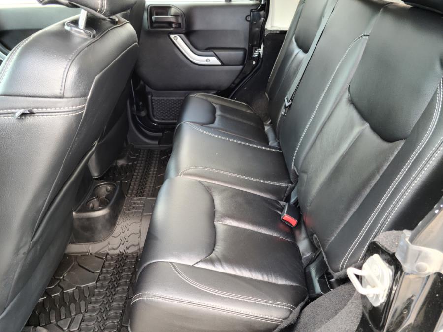 2014 Jeep Wrangler Unlimited 4WD 4dr Sahara, available for sale in Milford, Connecticut | Chip's Auto Sales Inc. Milford, Connecticut 2014 Jeep Wrangler Unlimited 4WD 4dr Sahara, available for sale in Milford, Connecticut | Chip's Auto Sales Inc. Milford, Connecticut