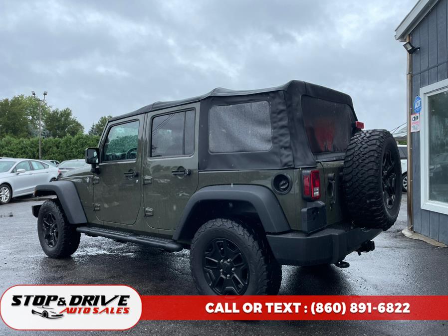 2015 Jeep Wrangler Unlimited 4WD 4dr Sport, available for sale in East Windsor, Connecticut | Stop & Drive Auto Sales. East Windsor, Connecticut 2015 Jeep Wrangler Unlimited 4WD 4dr Sport, available for sale in East Windsor, Connecticut | Stop & Drive Auto Sales. East Windsor, Connecticut