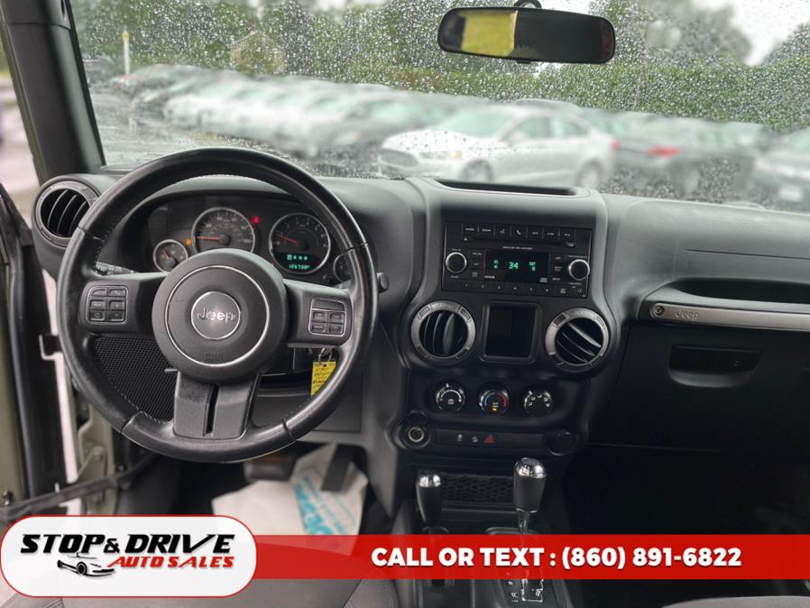 2015 Jeep Wrangler Unlimited 4WD 4dr Sport, available for sale in East Windsor, Connecticut | Stop & Drive Auto Sales. East Windsor, Connecticut 2015 Jeep Wrangler Unlimited 4WD 4dr Sport, available for sale in East Windsor, Connecticut | Stop & Drive Auto Sales. East Windsor, Connecticut