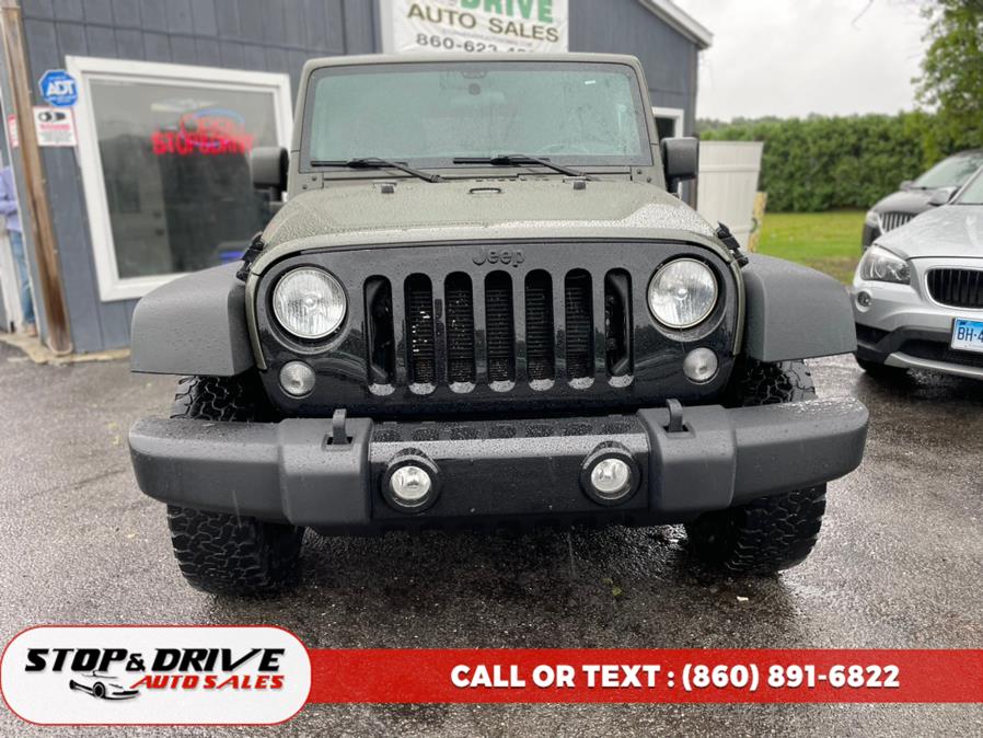 2015 Jeep Wrangler Unlimited 4WD 4dr Sport, available for sale in East Windsor, Connecticut | Stop & Drive Auto Sales. East Windsor, Connecticut 2015 Jeep Wrangler Unlimited 4WD 4dr Sport, available for sale in East Windsor, Connecticut | Stop & Drive Auto Sales. East Windsor, Connecticut