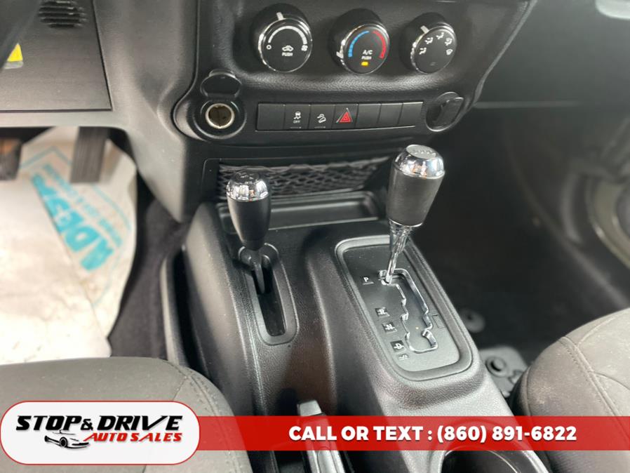 2015 Jeep Wrangler Unlimited 4WD 4dr Sport, available for sale in East Windsor, Connecticut | Stop & Drive Auto Sales. East Windsor, Connecticut 2015 Jeep Wrangler Unlimited 4WD 4dr Sport, available for sale in East Windsor, Connecticut | Stop & Drive Auto Sales. East Windsor, Connecticut
