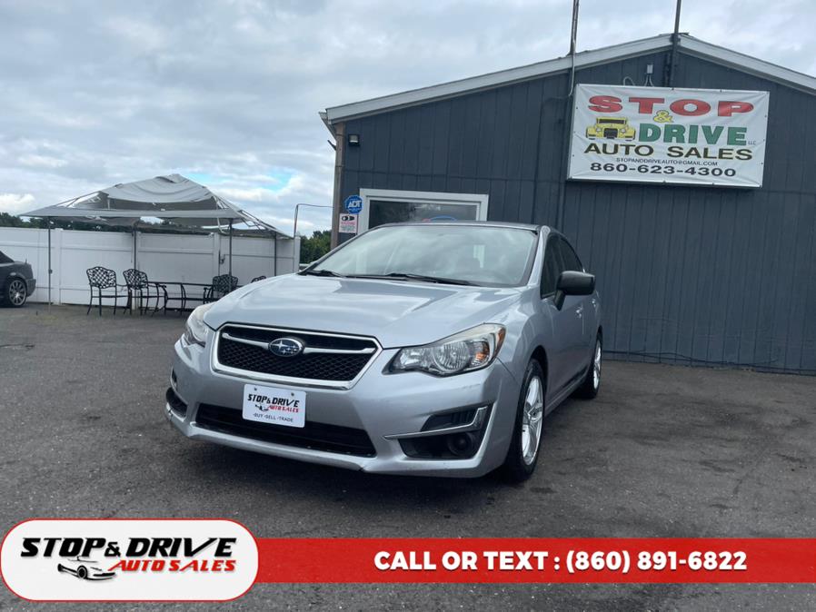 2015 Subaru Impreza Sedan 4dr Man 2.0i, available for sale in East Windsor, Connecticut | Stop & Drive Auto Sales. East Windsor, Connecticut 2015 Subaru Impreza Sedan 4dr Man 2.0i, available for sale in East Windsor, Connecticut | Stop & Drive Auto Sales. East Windsor, Connecticut
