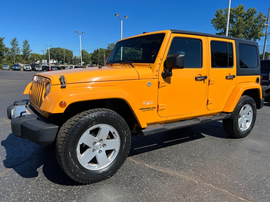 2012 Jeep Wrangler Unlimited 4WD 4dr Altitude, available for sale in Ortonville, Michigan | Marsh Auto Sales LLC. Ortonville, Michigan