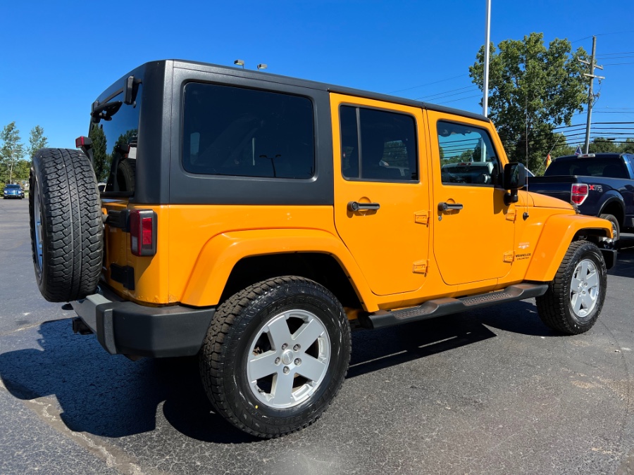 2012 Jeep Wrangler Unlimited 4WD 4dr Altitude, available for sale in Ortonville, Michigan | Marsh Auto Sales LLC. Ortonville, Michigan 2012 Jeep Wrangler Unlimited 4WD 4dr Altitude, available for sale in Ortonville, Michigan | Marsh Auto Sales LLC. Ortonville, Michigan