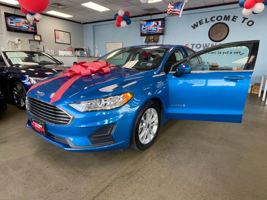 2019 Ford Fusion Hybrid SE FWD, available for sale in Inwood, New York | 5 Towns Drive. Inwood, New York 2019 Ford Fusion Hybrid SE FWD, available for sale in Inwood, New York | 5 Towns Drive. Inwood, New York
