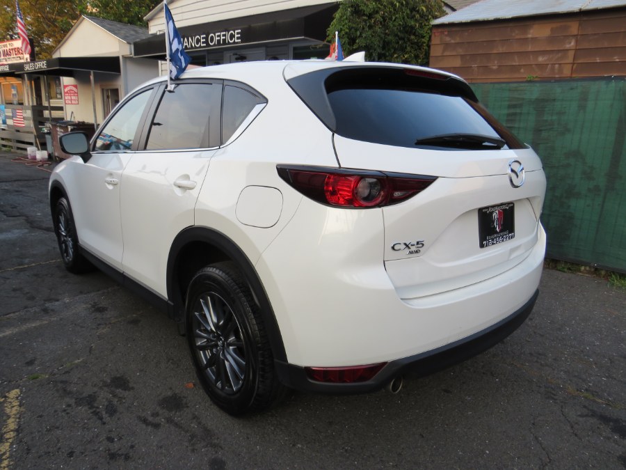 2021 Mazda CX-5 Touring AWD, available for sale in Middle Village, New York | Road Masters II INC. Middle Village, New York 2021 Mazda CX-5 Touring AWD, available for sale in Middle Village, New York | Road Masters II INC. Middle Village, New York