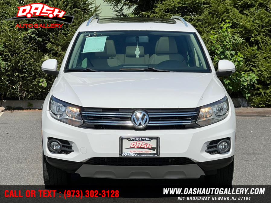2012 Volkswagen Tiguan 2WD 4dr Auto SE w/Sunroof & Nav, available for sale in Newark, New Jersey | Dash Auto Gallery Inc.. Newark, New Jersey 2012 Volkswagen Tiguan 2WD 4dr Auto SE w/Sunroof & Nav, available for sale in Newark, New Jersey | Dash Auto Gallery Inc.. Newark, New Jersey