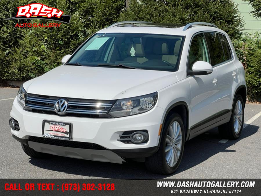 2012 Volkswagen Tiguan 2WD 4dr Auto SE w/Sunroof & Nav, available for sale in Newark, New Jersey | Dash Auto Gallery Inc.. Newark, New Jersey 2012 Volkswagen Tiguan 2WD 4dr Auto SE w/Sunroof & Nav, available for sale in Newark, New Jersey | Dash Auto Gallery Inc.. Newark, New Jersey
