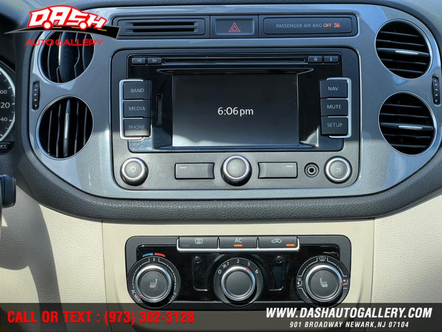 2012 Volkswagen Tiguan 2WD 4dr Auto SE w/Sunroof & Nav, available for sale in Newark, New Jersey | Dash Auto Gallery Inc.. Newark, New Jersey 2012 Volkswagen Tiguan 2WD 4dr Auto SE w/Sunroof & Nav, available for sale in Newark, New Jersey | Dash Auto Gallery Inc.. Newark, New Jersey