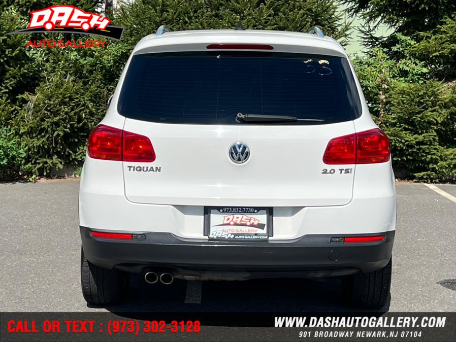 2012 Volkswagen Tiguan 2WD 4dr Auto SE w/Sunroof & Nav, available for sale in Newark, New Jersey | Dash Auto Gallery Inc.. Newark, New Jersey 2012 Volkswagen Tiguan 2WD 4dr Auto SE w/Sunroof & Nav, available for sale in Newark, New Jersey | Dash Auto Gallery Inc.. Newark, New Jersey