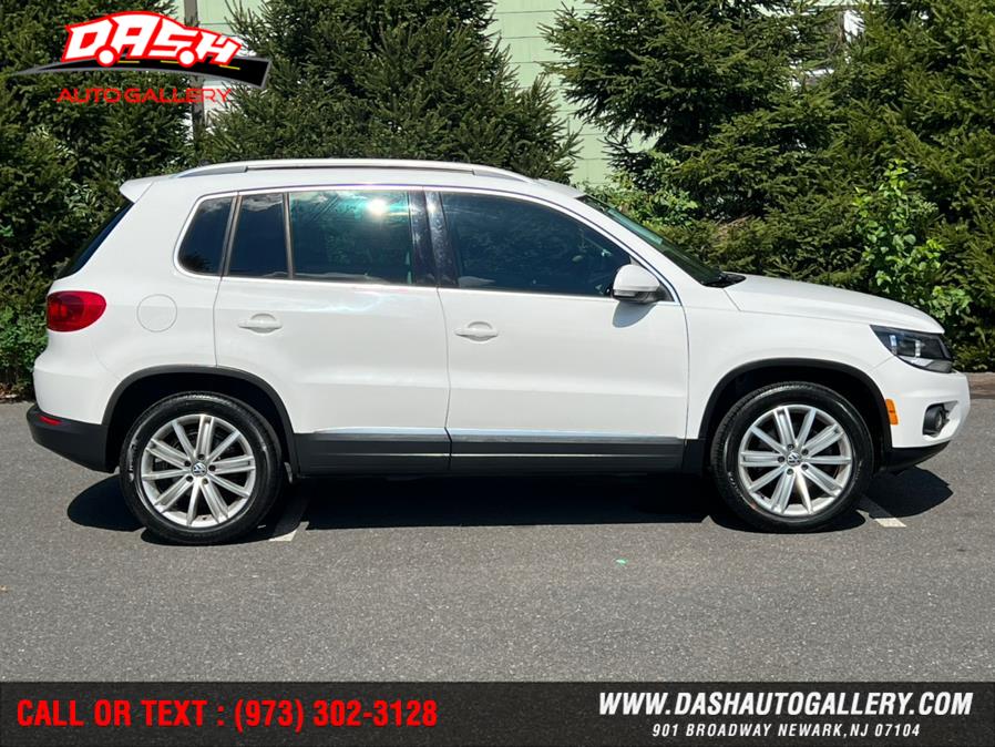 2012 Volkswagen Tiguan 2WD 4dr Auto SE w/Sunroof & Nav, available for sale in Newark, New Jersey | Dash Auto Gallery Inc.. Newark, New Jersey 2012 Volkswagen Tiguan 2WD 4dr Auto SE w/Sunroof & Nav, available for sale in Newark, New Jersey | Dash Auto Gallery Inc.. Newark, New Jersey