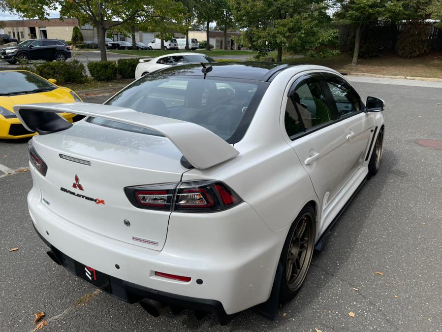 2015 Mitsubishi Lancer Evolution Final Edition, available for sale in Bayshore, New York | Evolving Motorsports. Bayshore, New York 2015 Mitsubishi Lancer Evolution Final Edition, available for sale in Bayshore, New York | Evolving Motorsports. Bayshore, New York