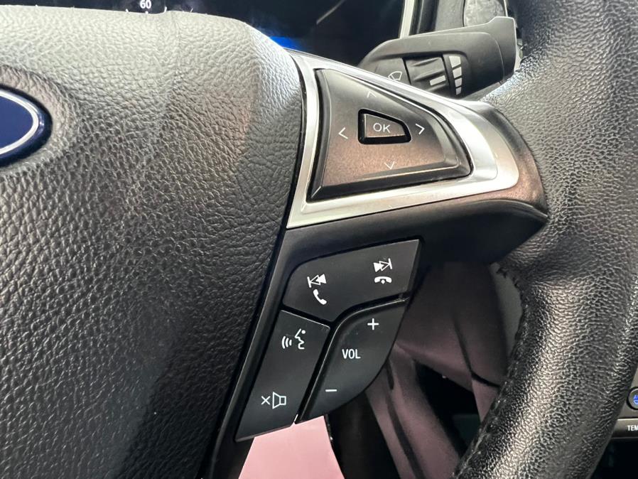 2020 Ford Fusion Hybrid Titanium FWD, available for sale in Massapequa Park, New York | Power Motors East. Massapequa Park, New York 2020 Ford Fusion Hybrid Titanium FWD, available for sale in Massapequa Park, New York | Power Motors East. Massapequa Park, New York