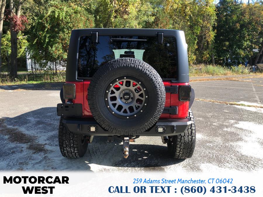2014 Jeep Wrangler Unlimited 4WD 4dr Sport, available for sale in Manchester, Connecticut | Motorcar West. Manchester, Connecticut 2014 Jeep Wrangler Unlimited 4WD 4dr Sport, available for sale in Manchester, Connecticut | Motorcar West. Manchester, Connecticut