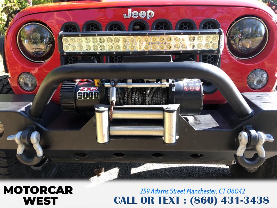 2014 Jeep Wrangler Unlimited 4WD 4dr Sport, available for sale in Manchester, Connecticut | Motorcar West. Manchester, Connecticut 2014 Jeep Wrangler Unlimited 4WD 4dr Sport, available for sale in Manchester, Connecticut | Motorcar West. Manchester, Connecticut