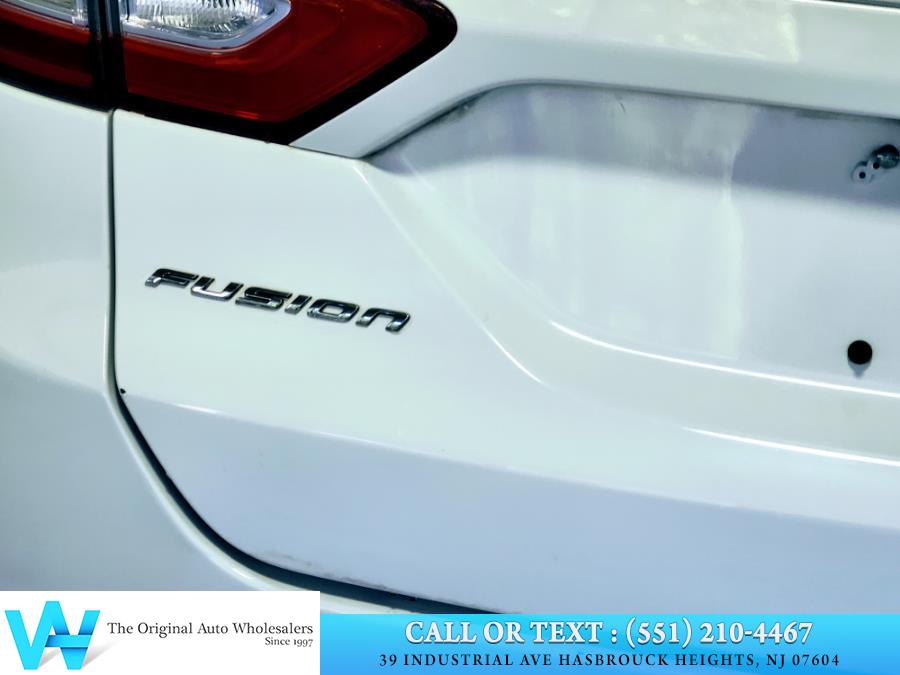 2014 Ford Fusion 4dr Sdn Titanium FWD, available for sale in Lodi, New Jersey | AW Auto & Truck Wholesalers, Inc. Lodi, New Jersey 2014 Ford Fusion 4dr Sdn Titanium FWD, available for sale in Lodi, New Jersey | AW Auto & Truck Wholesalers, Inc. Lodi, New Jersey