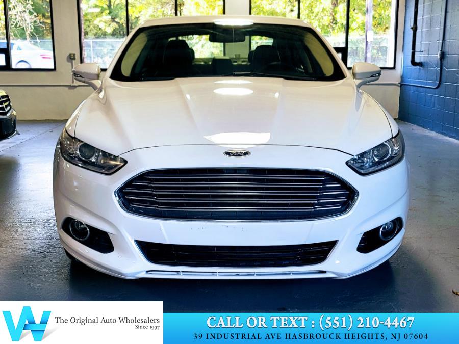 2014 Ford Fusion 4dr Sdn Titanium FWD, available for sale in Lodi, New Jersey | AW Auto & Truck Wholesalers, Inc. Lodi, New Jersey 2014 Ford Fusion 4dr Sdn Titanium FWD, available for sale in Lodi, New Jersey | AW Auto & Truck Wholesalers, Inc. Lodi, New Jersey
