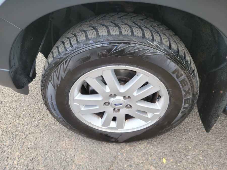 2007 Ford Explorer Sport Trac 4WD 4dr V8 XLT W/Sunroof, available for sale in East Windsor, Connecticut | Toro Auto. East Windsor, Connecticut 2007 Ford Explorer Sport Trac 4WD 4dr V8 XLT W/Sunroof, available for sale in East Windsor, Connecticut | Toro Auto. East Windsor, Connecticut