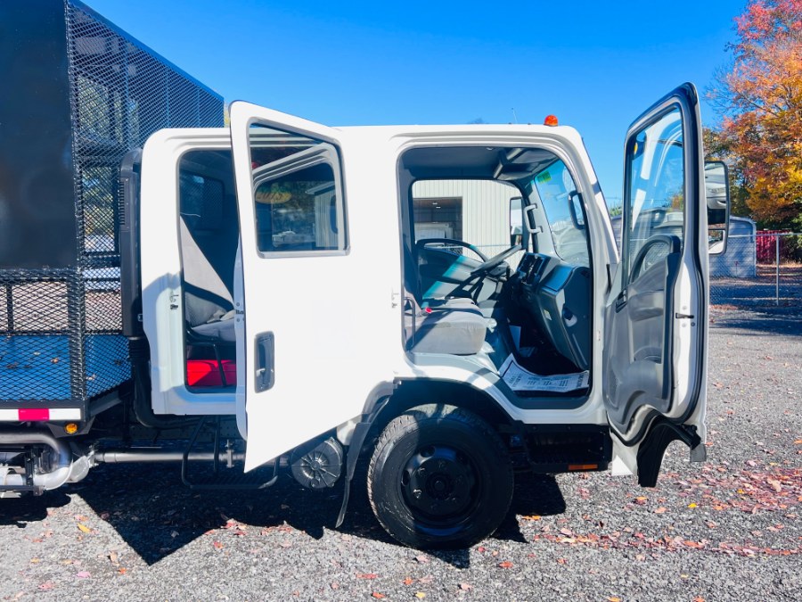 2015 Isuzu NPR HD DSL CREW LANDSCAPE FLATBED BODY CREW CAB + NO CDL, available for sale in South Amboy, New Jersey | NJ Truck Spot. South Amboy, New Jersey 2015 Isuzu NPR HD DSL CREW LANDSCAPE FLATBED BODY CREW CAB + NO CDL, available for sale in South Amboy, New Jersey | NJ Truck Spot. South Amboy, New Jersey