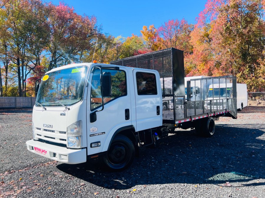2015 Isuzu NPR HD DSL CREW LANDSCAPE FLATBED BODY CREW CAB + NO CDL, available for sale in South Amboy, New Jersey | NJ Truck Spot. South Amboy, New Jersey 2015 Isuzu NPR HD DSL CREW LANDSCAPE FLATBED BODY CREW CAB + NO CDL, available for sale in South Amboy, New Jersey | NJ Truck Spot. South Amboy, New Jersey