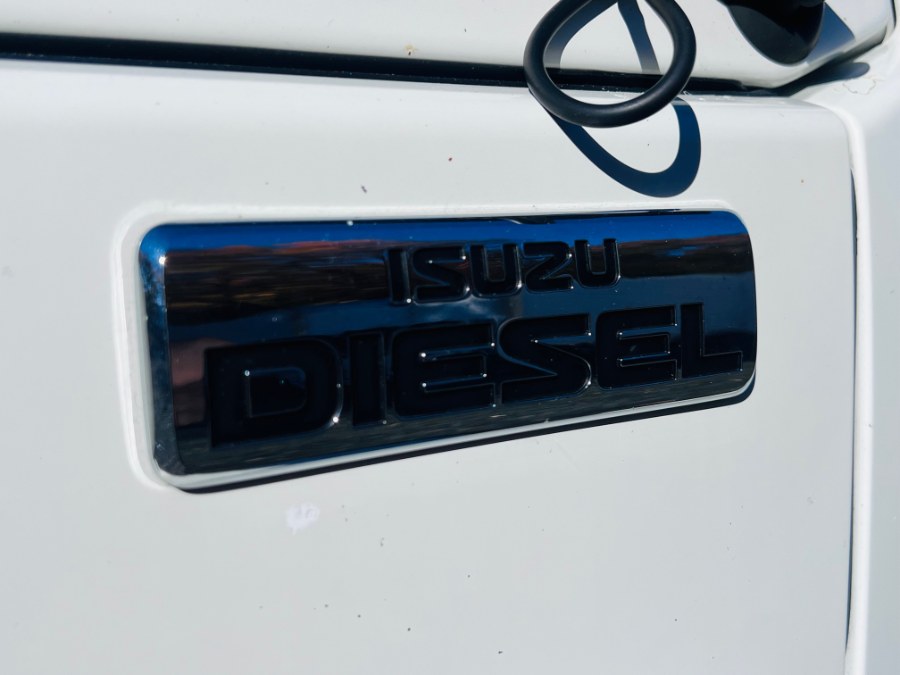 2015 Isuzu NPR HD DSL CREW LANDSCAPE FLATBED BODY CREW CAB + NO CDL, available for sale in South Amboy, New Jersey | NJ Truck Spot. South Amboy, New Jersey 2015 Isuzu NPR HD DSL CREW LANDSCAPE FLATBED BODY CREW CAB + NO CDL, available for sale in South Amboy, New Jersey | NJ Truck Spot. South Amboy, New Jersey