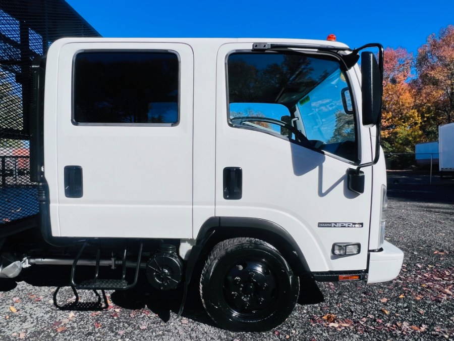 2015 Isuzu NPR HD DSL CREW LANDSCAPE FLATBED BODY CREW CAB + NO CDL, available for sale in South Amboy, New Jersey | NJ Truck Spot. South Amboy, New Jersey 2015 Isuzu NPR HD DSL CREW LANDSCAPE FLATBED BODY CREW CAB + NO CDL, available for sale in South Amboy, New Jersey | NJ Truck Spot. South Amboy, New Jersey